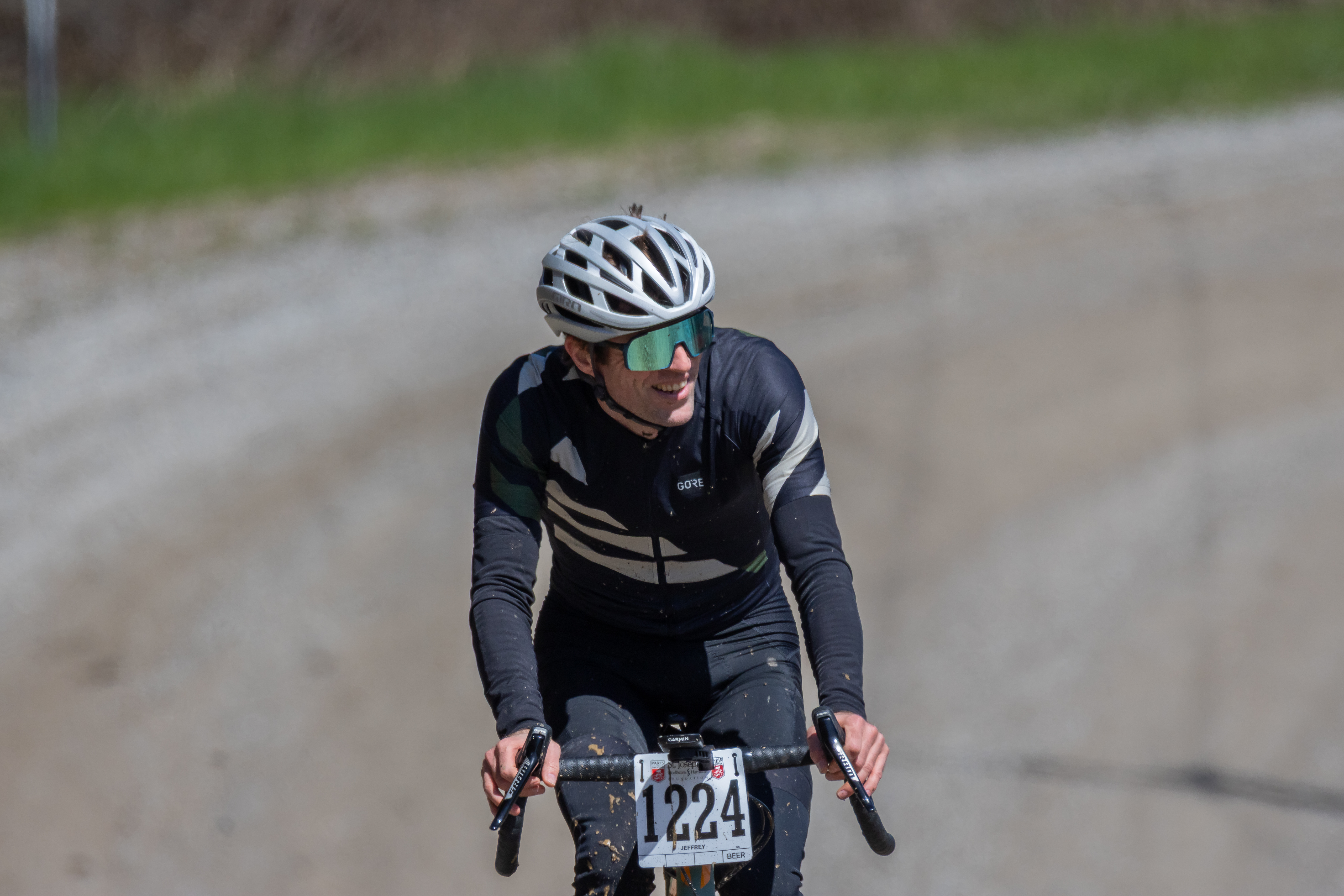 smiling because I&rsquo;m riding my bike